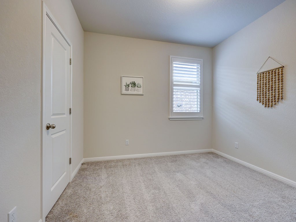 325 Serpens Street Georgetown, TX 78628 - Photo 23 of 40 Bedroom 4 has walk in closet