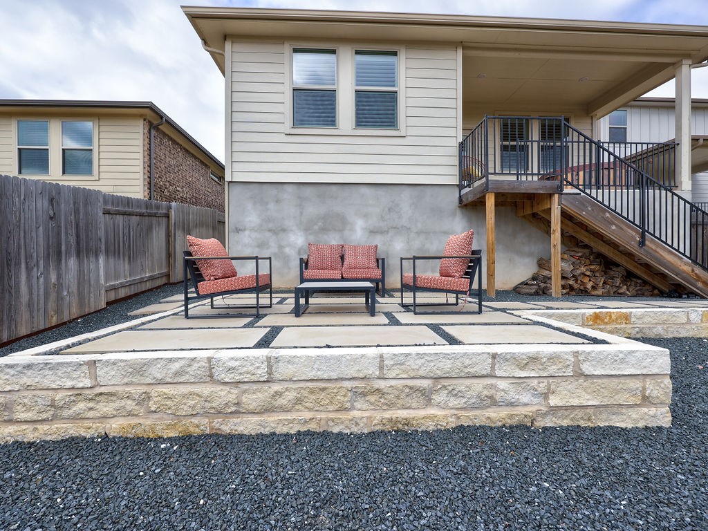 325 Serpens Street Georgetown, TX 78628 - Photo 27 of 40 Enjoy this fully xeriscaped backyard with additional outdoor living space