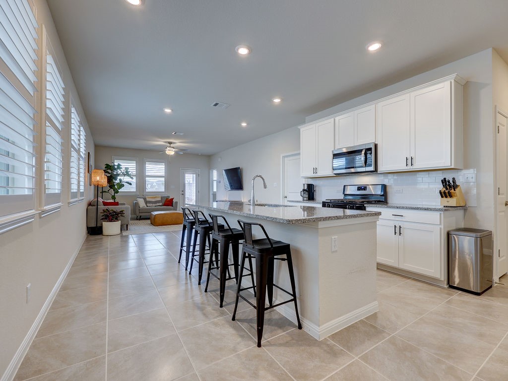 325 Serpens Street Georgetown, TX 78628 - Photo 40 of 40 Open floor plan with lots of windows for natural light