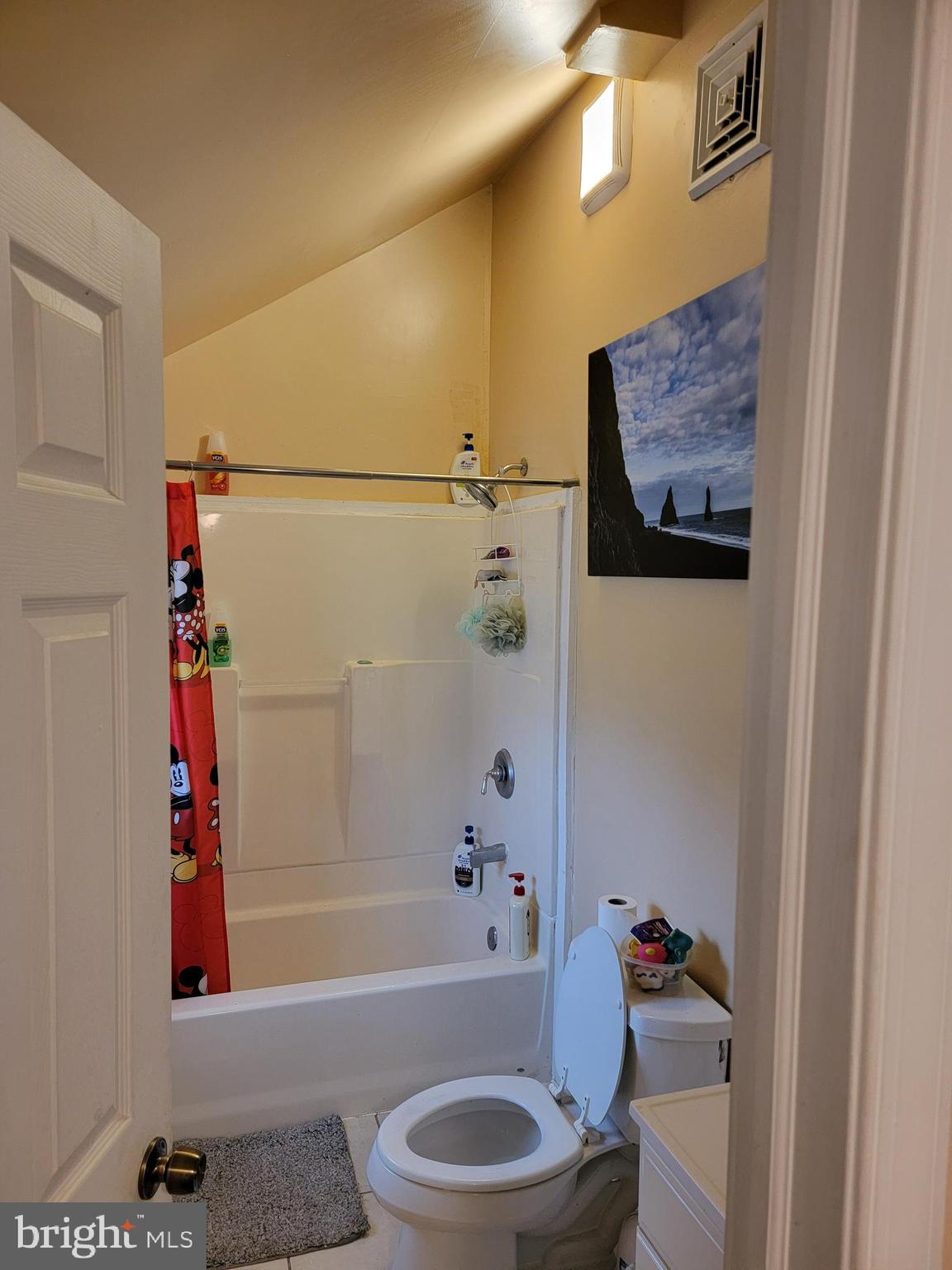 493 West Elmer Road Vineland, NJ 08360 - Photo 6 of 9 a bathroom with a toilet a sink and bathtub