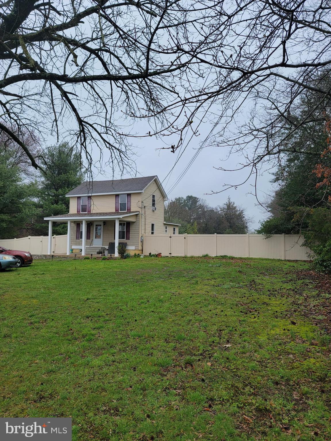 493 West Elmer Road Vineland, NJ 08360 - Photo 7 of 9 a view of a house with a big yard and large trees