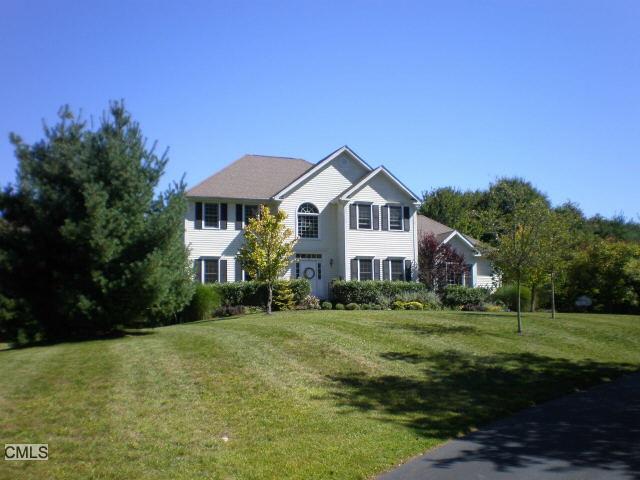 12 Huntingtown Road Monroe, CT 06468 - Photo 1 of 1 a front view of a house with a yard