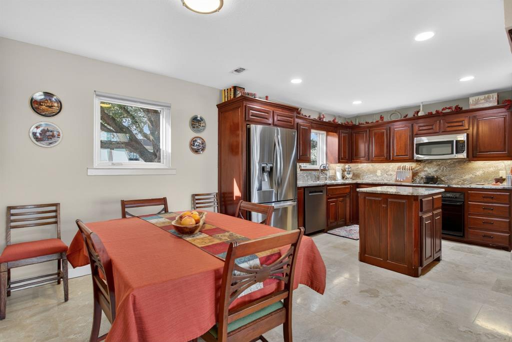 218 North Broadway Azle, TX 76020 - Photo 21 of 40 Spacious Kitchen with Eat In Dining