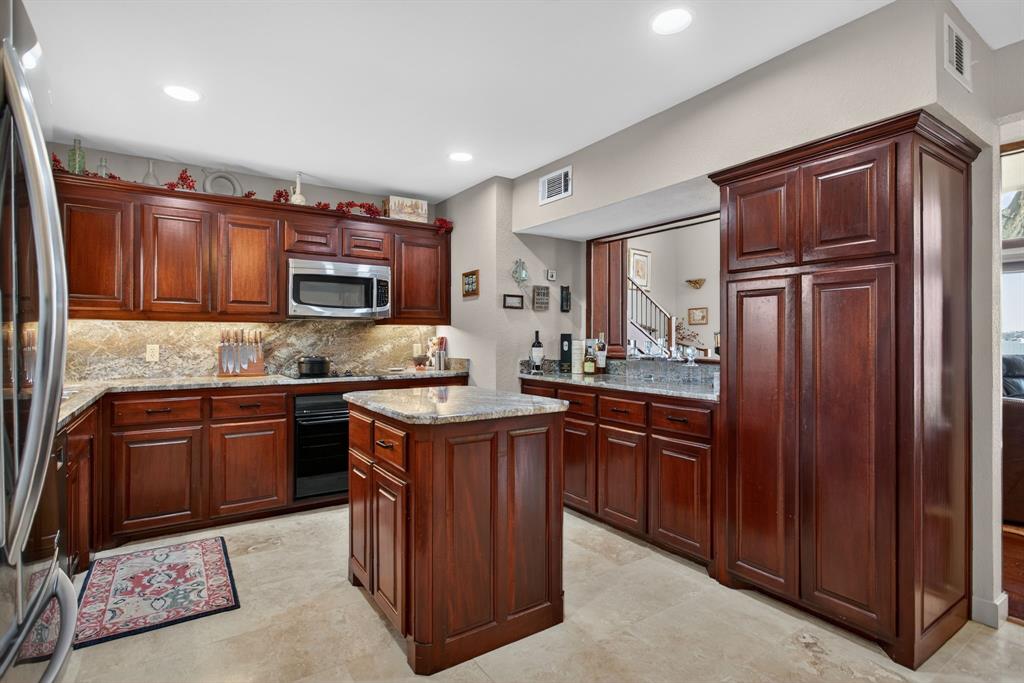 218 North Broadway Azle, TX 76020 - Photo 23 of 40 Mahogany custom cabinets with moveable island