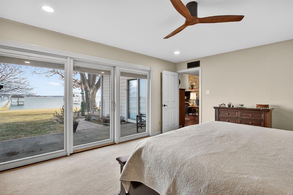 218 North Broadway Azle, TX 76020 - Photo 26 of 40 Another wall of glass in the Primary Bedroom