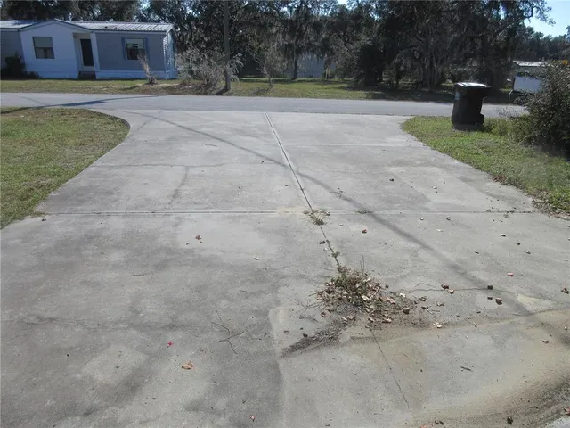 a view of a room that has a window in it