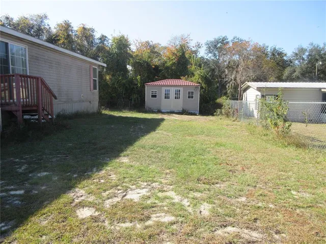 a kitchen with a sink cabinets and stainless steel appliances