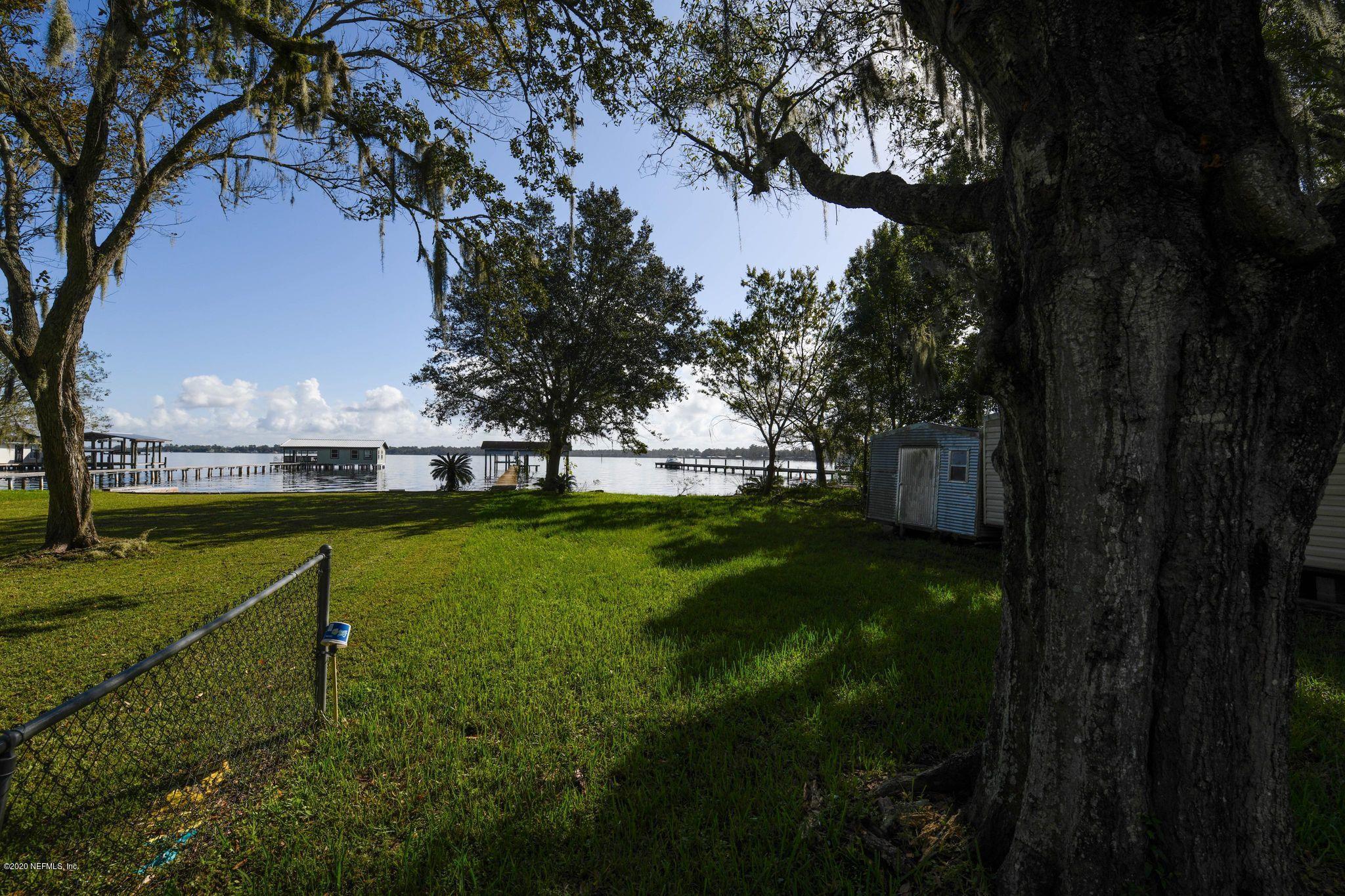 259 Brickyard Road, Unit C Middleburg, FL 32068 - Photo 16 of 17 a view of a park with large trees