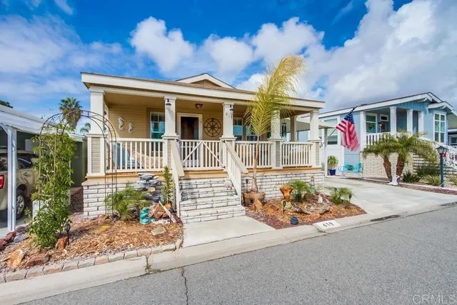 front view of a house with a street