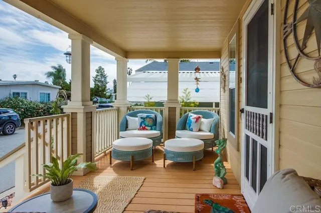 a view of a patio with a table and chairs