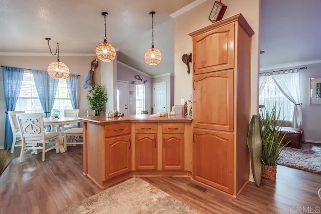 a utility room with sink dryer and washer