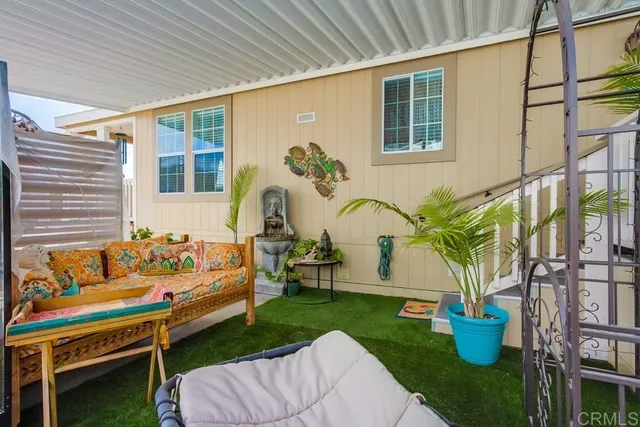 a view of outdoor space with porch and furniture