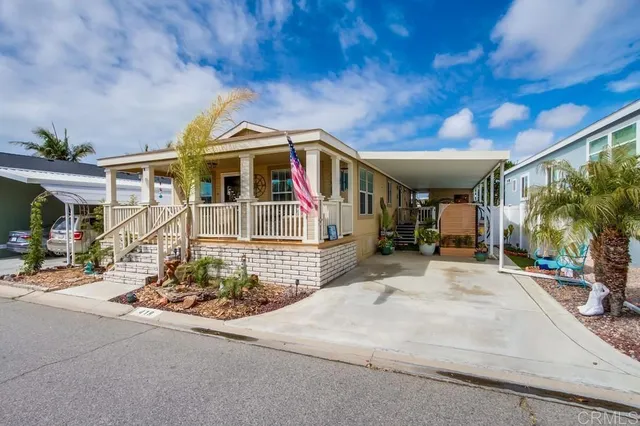 a view of a big room with table and chairs