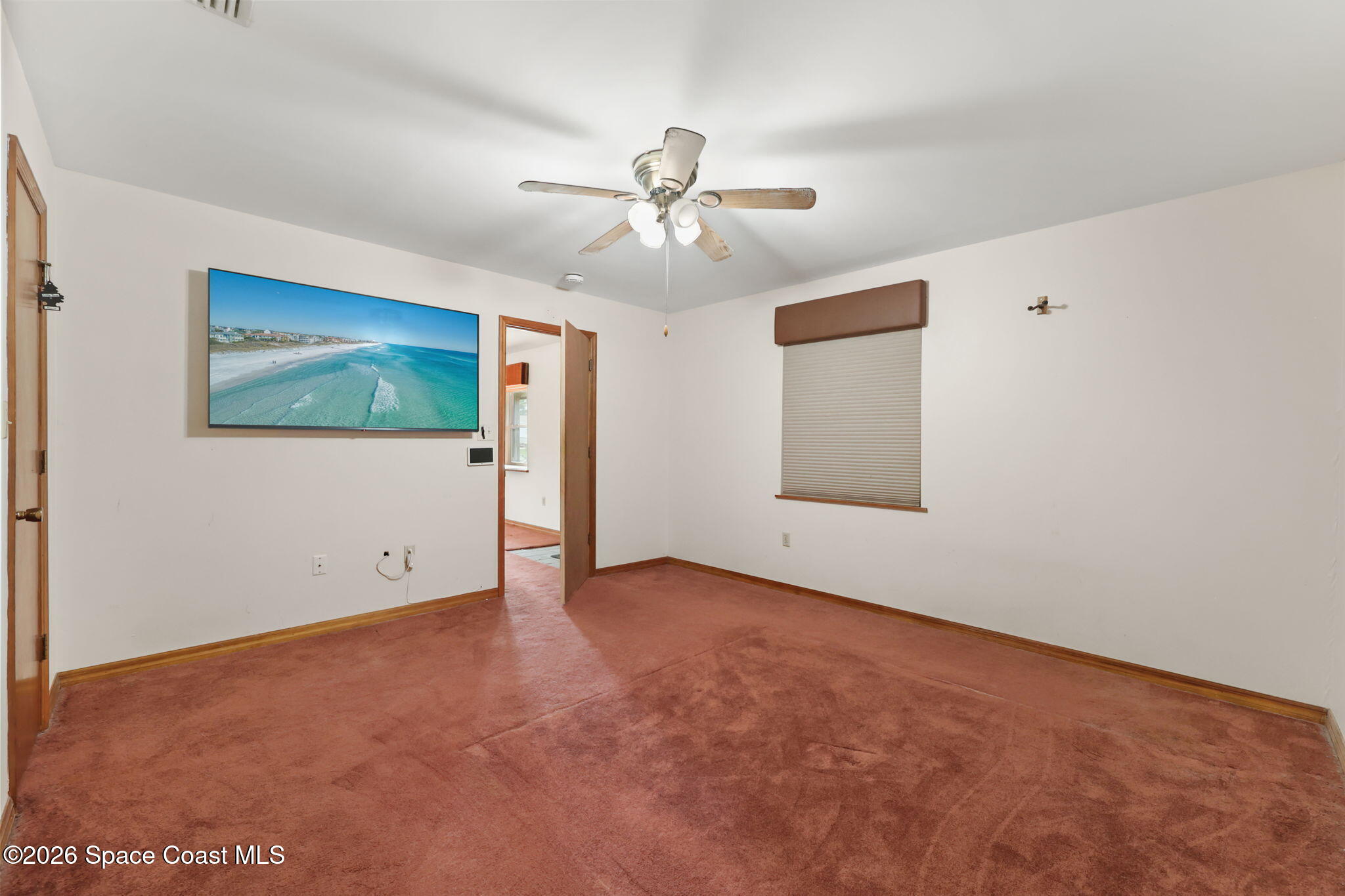 7256 Bright Avenue Cocoa, FL 32927 - Photo 13 of 29 Primary bedroom