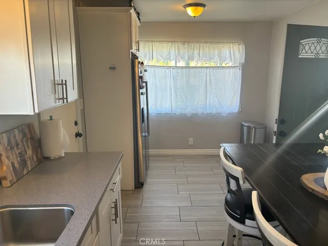 a bathroom with a tub sink and toilet