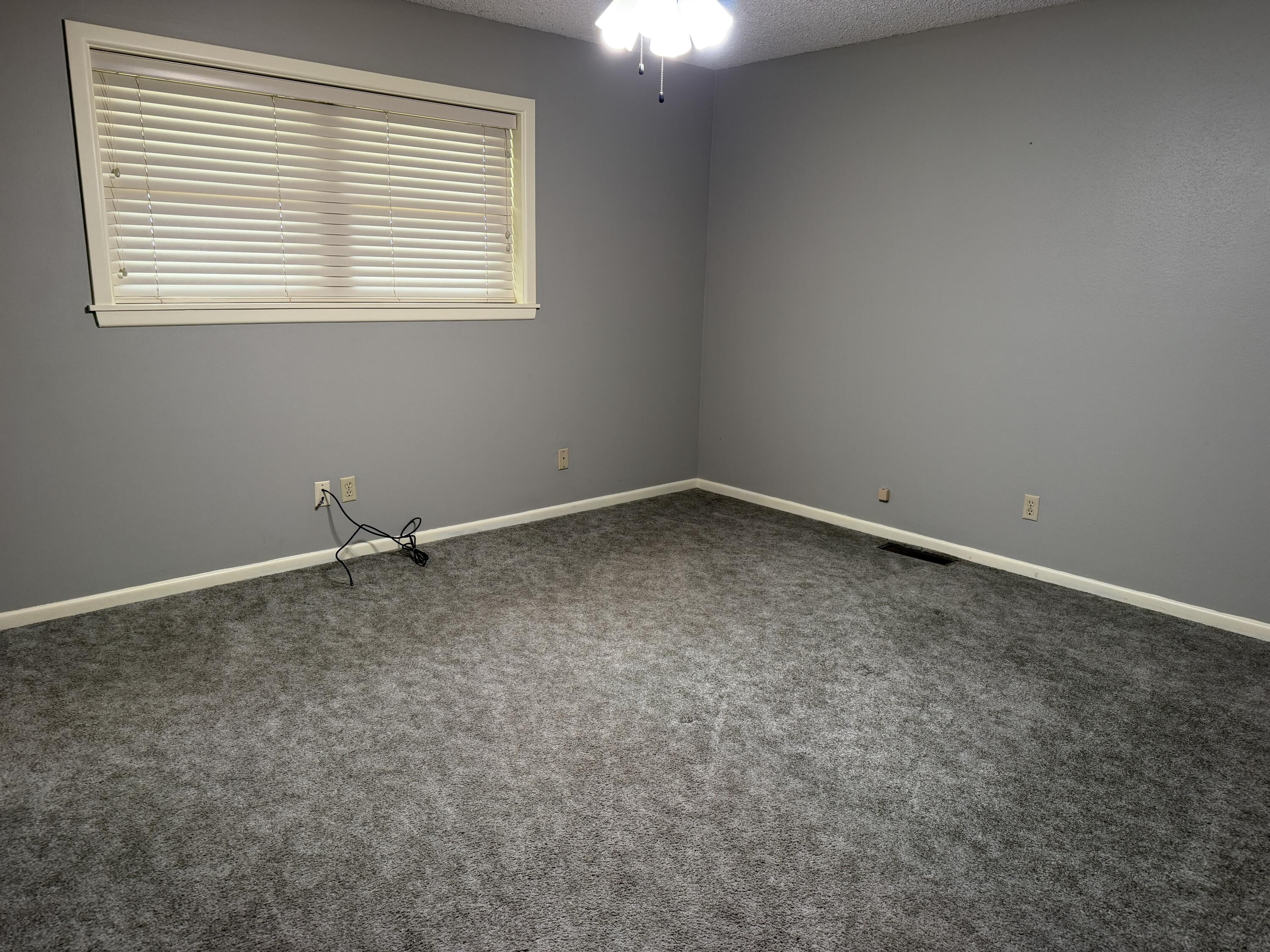 1603 South 8th Street Lamesa, TX 79331 - Photo 16 of 39 an empty room with a window