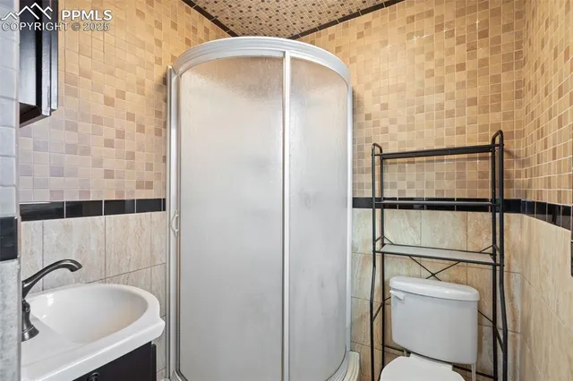 a view of a house with a street