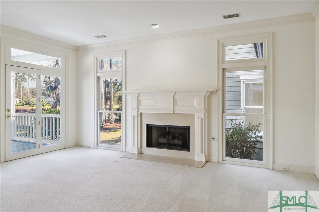17 Long Island Road Savannah, GA 31411 - Photo 26 of 35 Formal Living Room Has Fireplace and Picture Windo