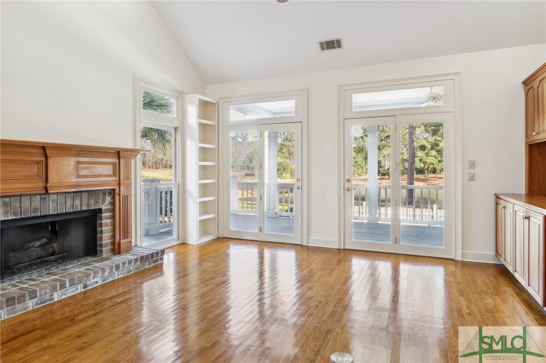 17 Long Island Road Savannah, GA 31411 - Photo 7 of 35 Family Room Has Windows and Glass Doors Leading to