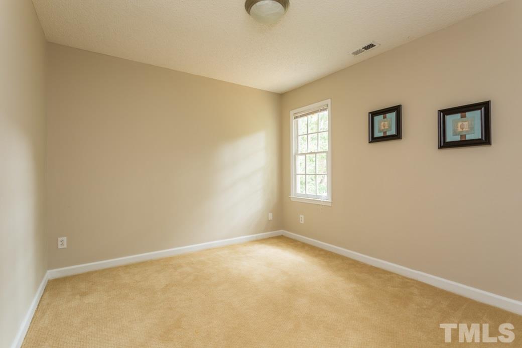 3600 East Jameson Road Raleigh, NC 27604 - Photo 11 of 15 a view of an empty room with a window