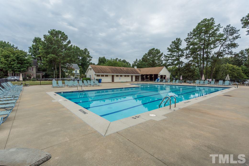3600 East Jameson Road Raleigh, NC 27604 - Photo 15 of 15 swimming view with swimming pool and trees in the background