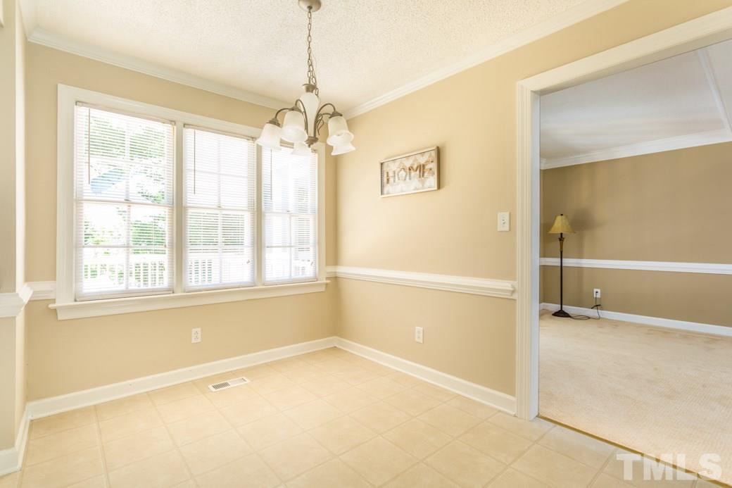 3600 East Jameson Road Raleigh, NC 27604 - Photo 4 of 15 a view of an empty room with a window