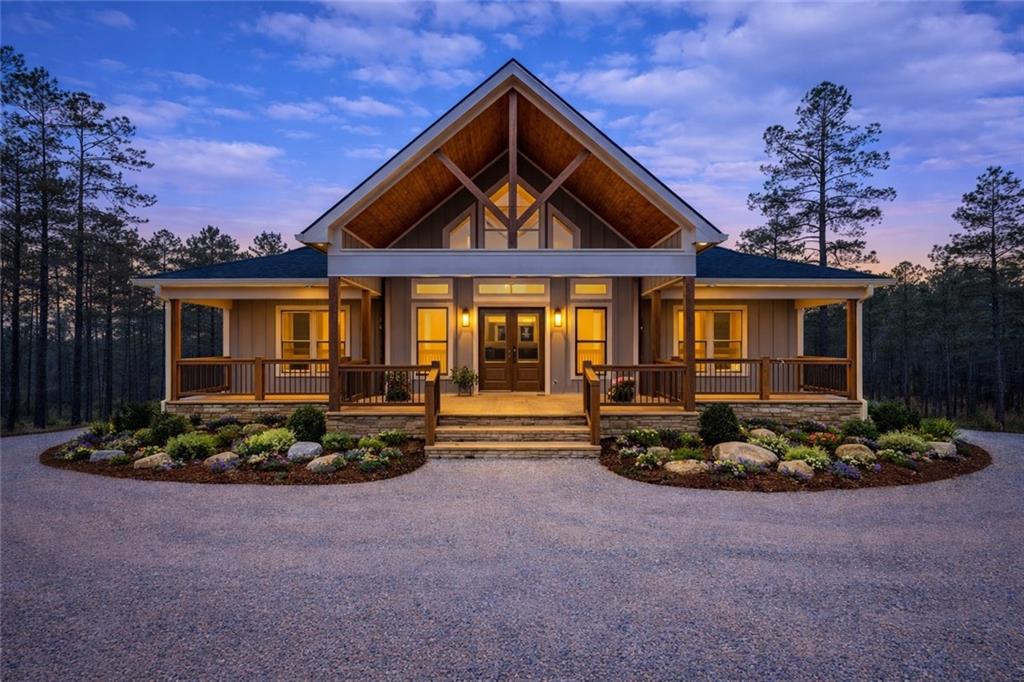 2956 Blalock Mountain Road Talking Rock, GA 30175 - Photo 55 of 65 a front view of a house with a yard
