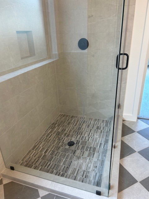 4418 Heather Xing Road Fulshear, TX 77441 - Photo 11 of 22 Beautiful tile combinations in the primary bath. Free standing shower a plus.