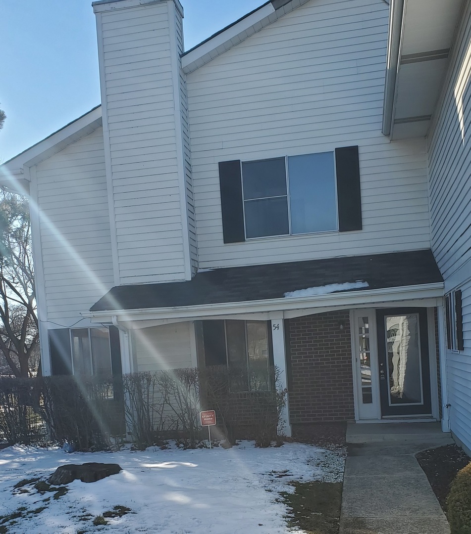 54 Churn Road Matteson, IL 60443 - Photo 1 of 19 a front view of a house