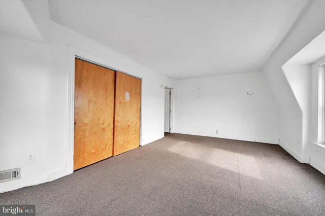 an empty room with a window