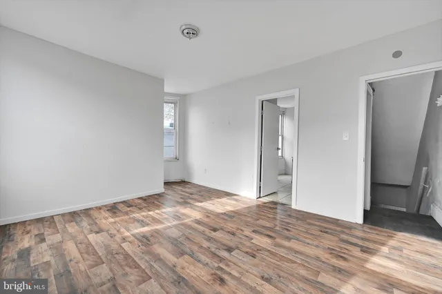 a view of an empty room and window