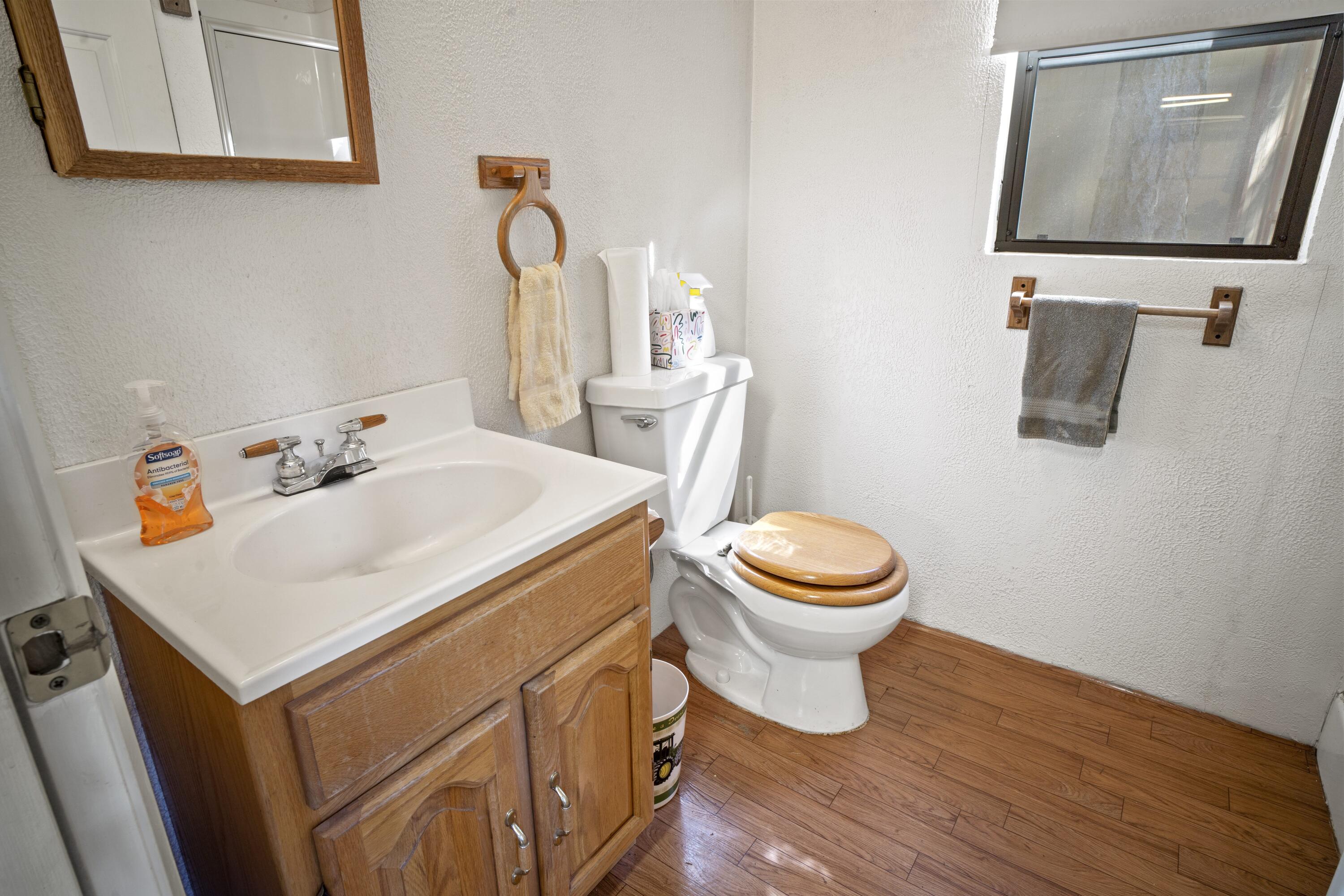2021 Queens Branch Road Rogue River, OR 97537 - Photo 29 of 37 a bathroom with a sink toilet and mirror