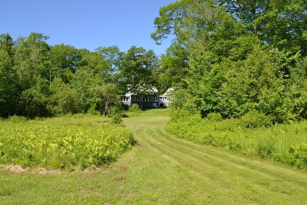 914 Main Road Westport Island, ME 04578 - Photo 27 of 35 Looking back at the house from the pond