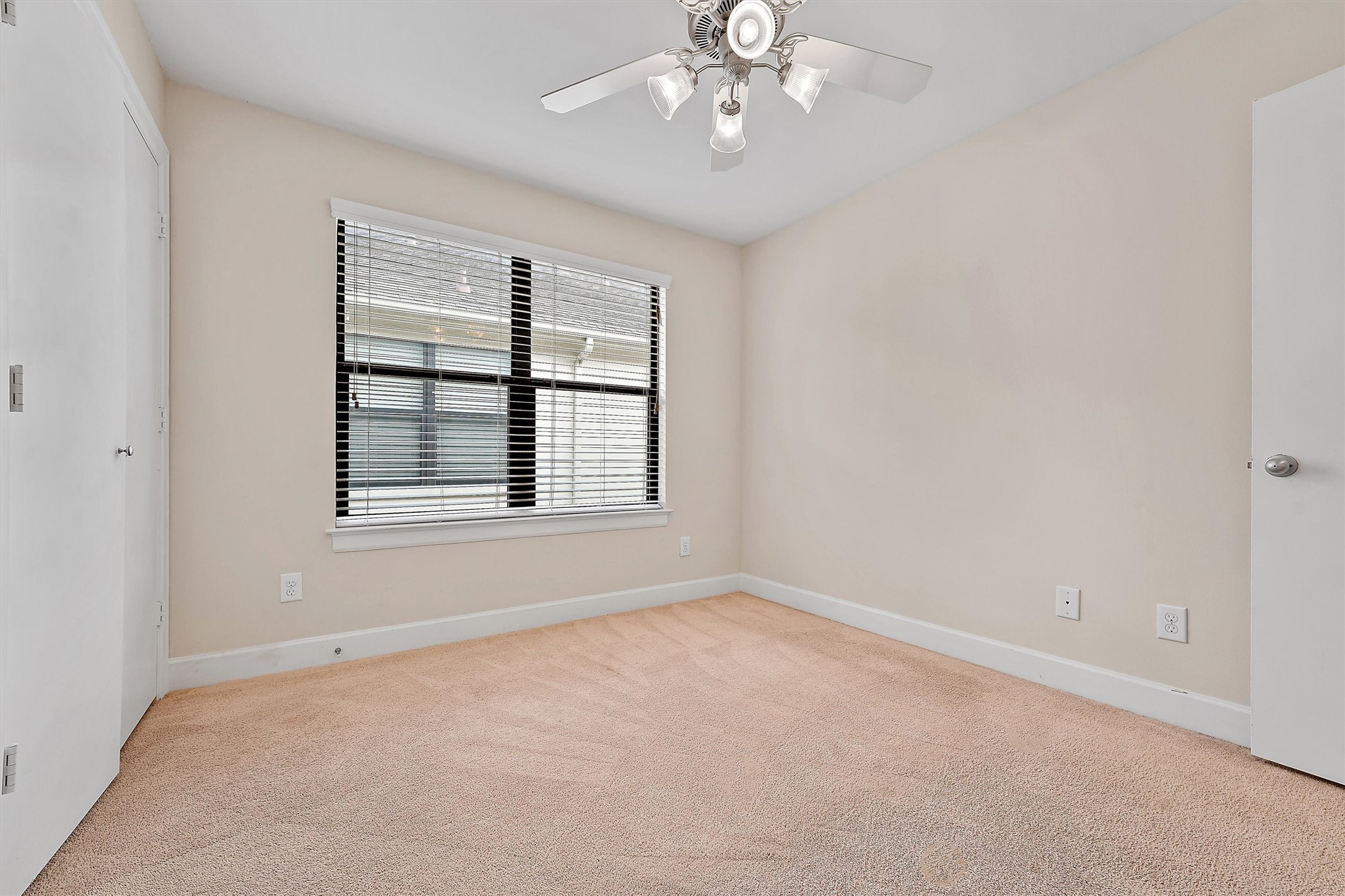 2710 Hullsmith Drive, Unit 903 Houston, TX 77063 - Photo 17 of 26 a view of an empty room with a window