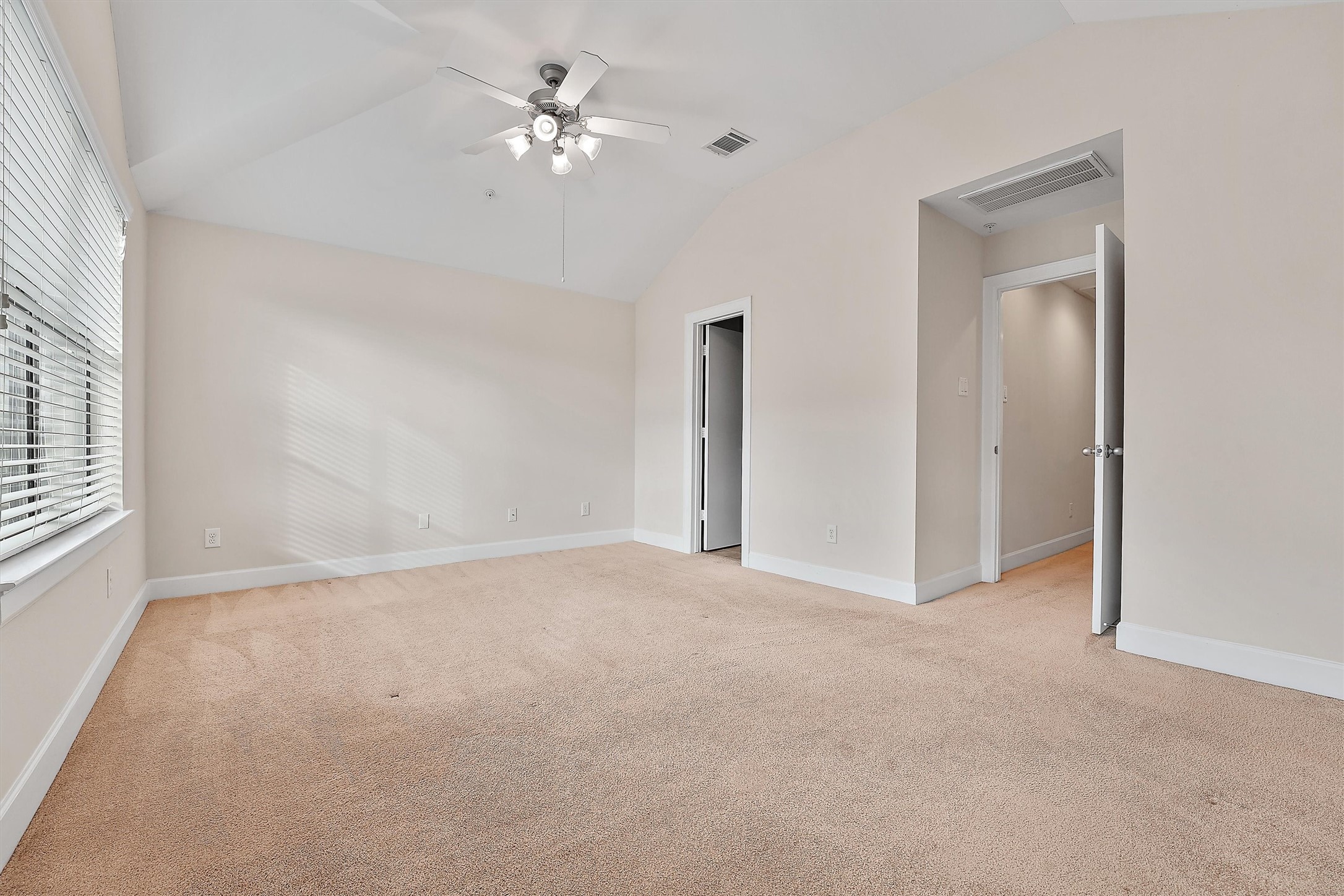 2710 Hullsmith Drive, Unit 903 Houston, TX 77063 - Photo 20 of 26 a view of an empty room with a window