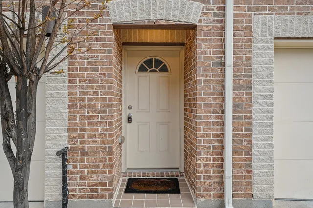 a front view of a house with a garage