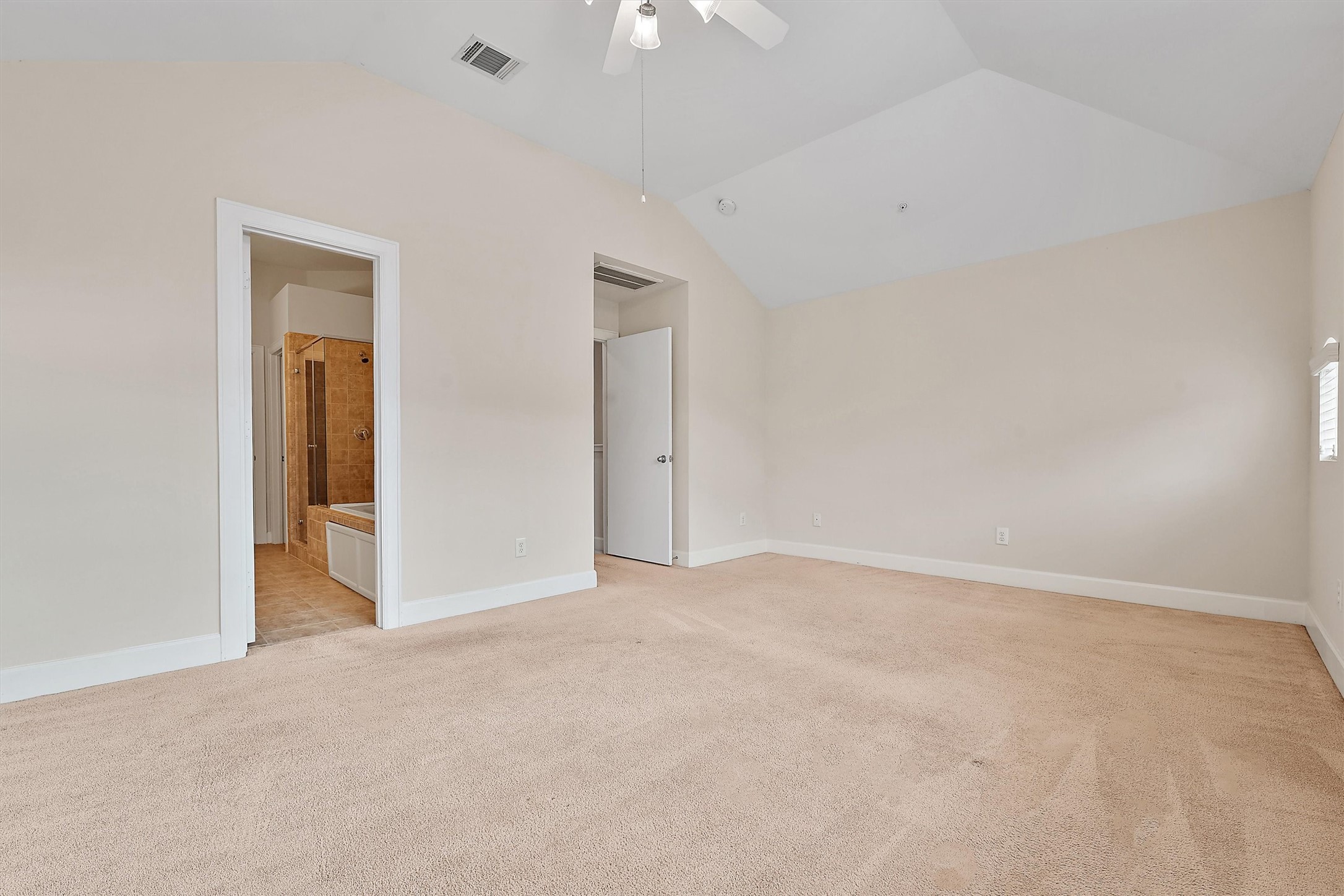 2710 Hullsmith Drive, Unit 903 Houston, TX 77063 - Photo 21 of 26 an empty room with fan and entrance