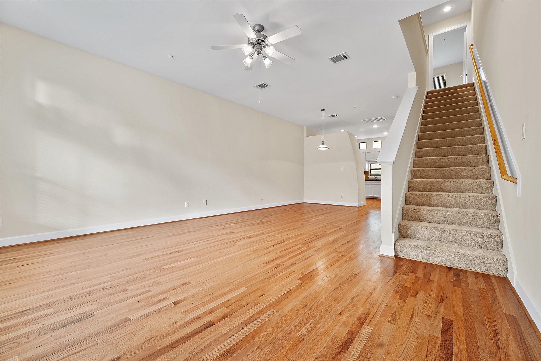 2710 Hullsmith Drive, Unit 903 Houston, TX 77063 - Photo 8 of 26 a view of entryway and hall with wooden floor