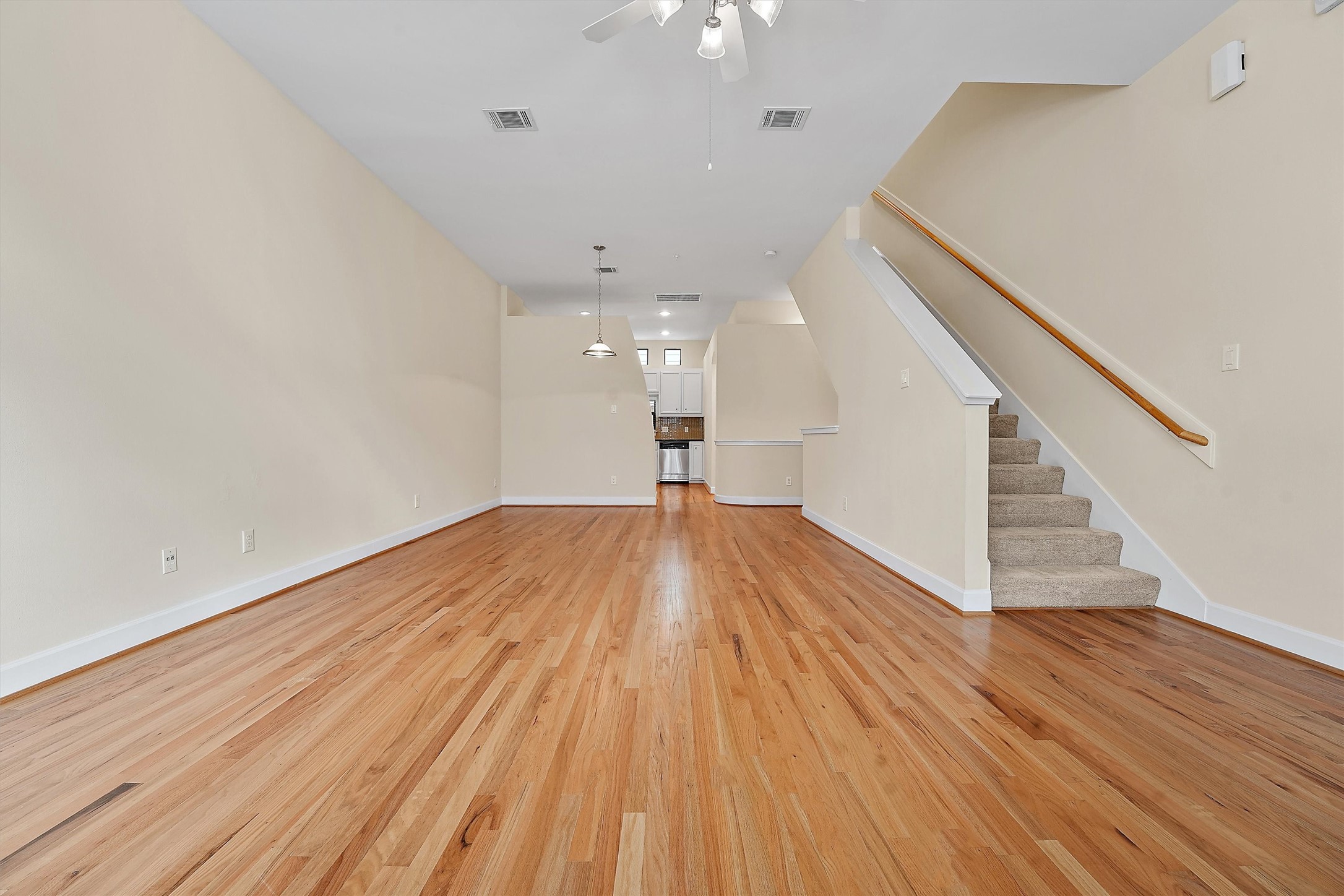 2710 Hullsmith Drive, Unit 903 Houston, TX 77063 - Photo 9 of 26 a view of empty room with wooden floor