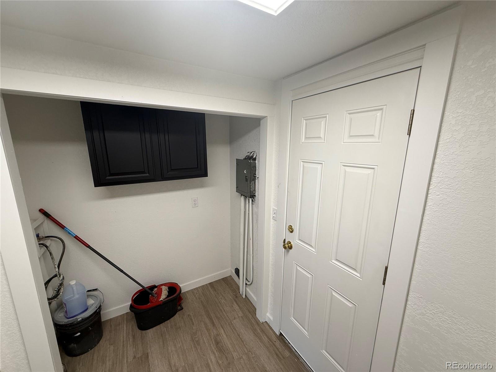 1045 Mac Davidson Circle Dacono, CO 80514 - Photo 25 of 32 a view of a storage & utility room