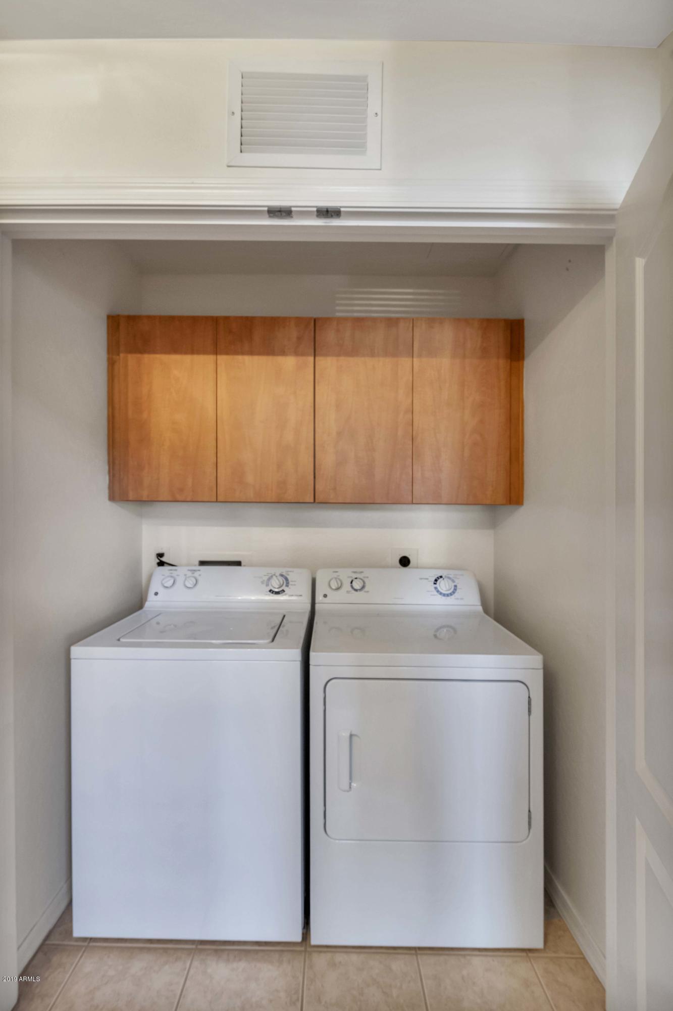 16 West Encanto Boulevard, Unit 615 Phoenix, AZ 85003 - Photo 12 of 33 a utility room with dryer and washer