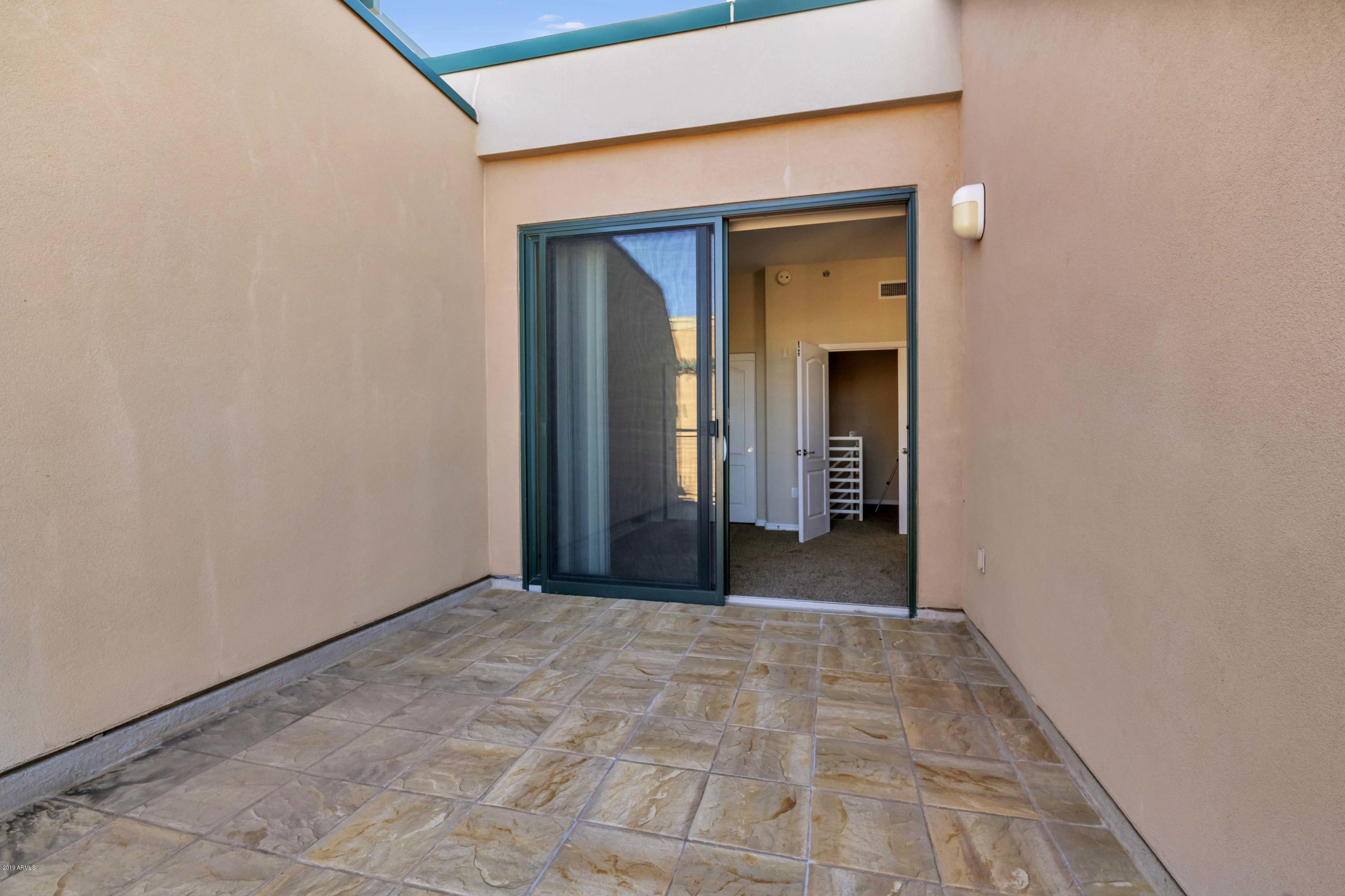 16 West Encanto Boulevard, Unit 615 Phoenix, AZ 85003 - Photo 23 of 33 a view of a room with a hallway