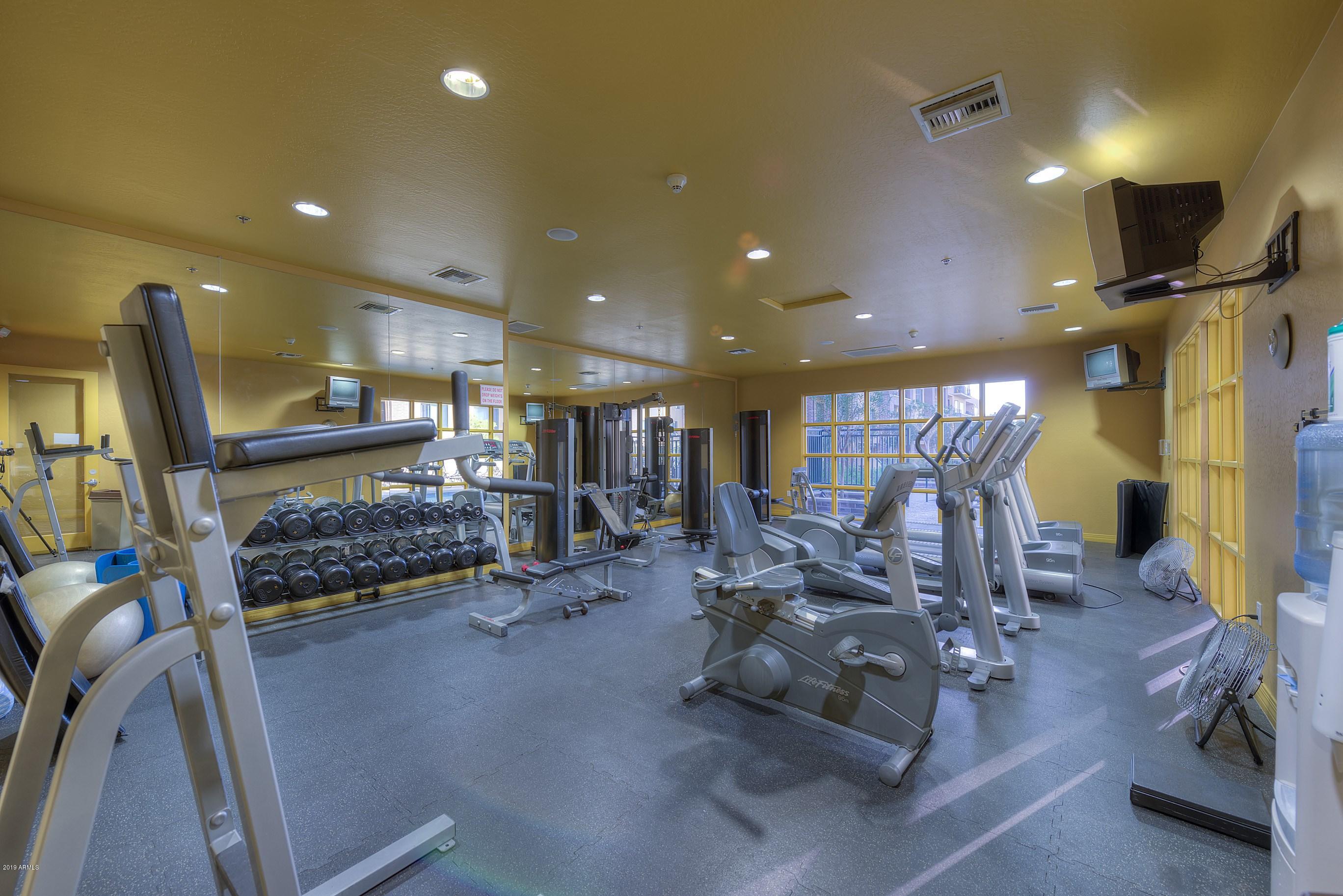 16 West Encanto Boulevard, Unit 615 Phoenix, AZ 85003 - Photo 27 of 33 a view of a room with gym equipment