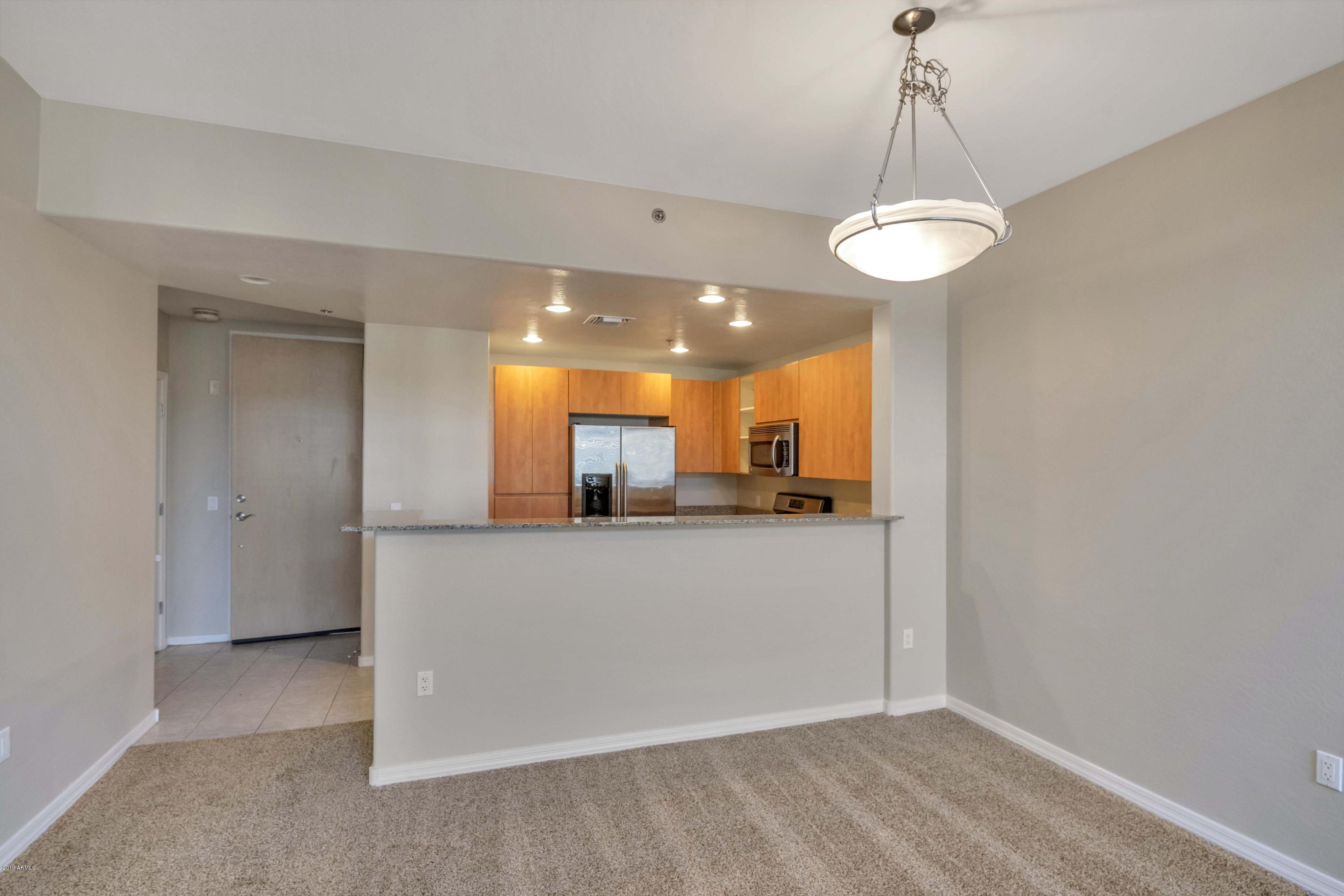 16 West Encanto Boulevard, Unit 615 Phoenix, AZ 85003 - Photo 6 of 33 a view of a kitchen and a window