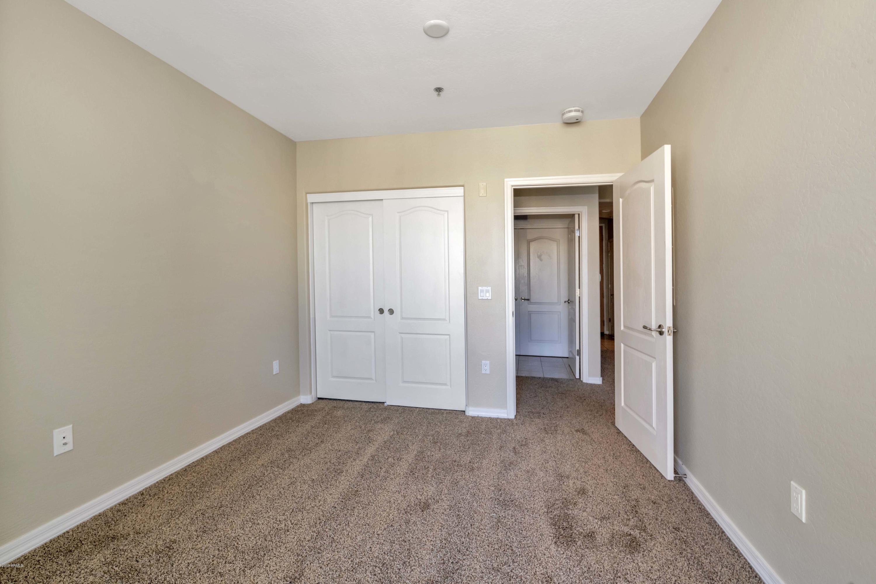 16 West Encanto Boulevard, Unit 615 Phoenix, AZ 85003 - Photo 8 of 33 a view of hallway with closet