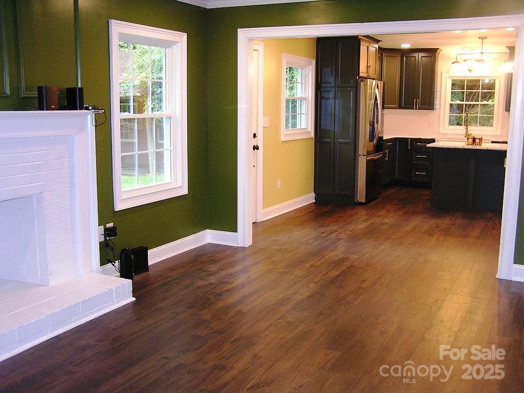 384 New River Heights Road, Unit 12 Boone, NC 28607 - Photo 12 of 30 wooden floor in an empty room with a window