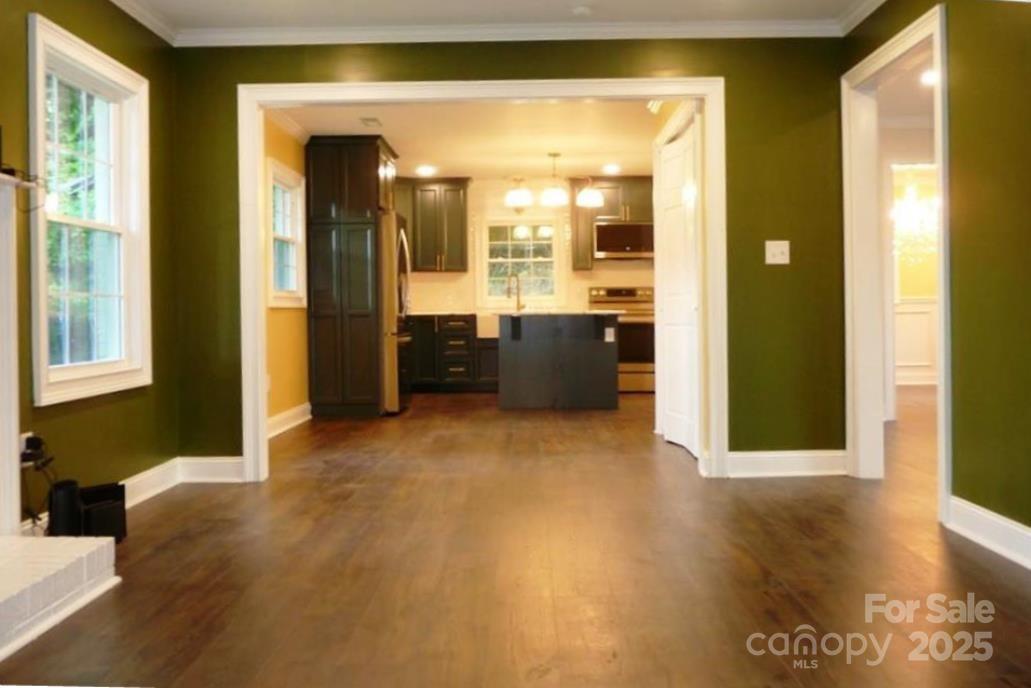 384 New River Heights Road, Unit 12 Boone, NC 28607 - Photo 14 of 30 a view of a hallway with wooden floor and a bathroom