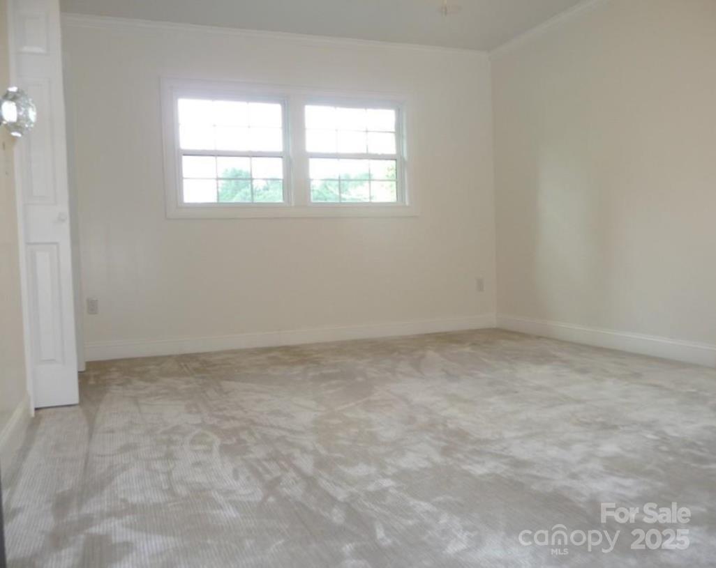 384 New River Heights Road, Unit 12 Boone, NC 28607 - Photo 17 of 30 an empty room with a window