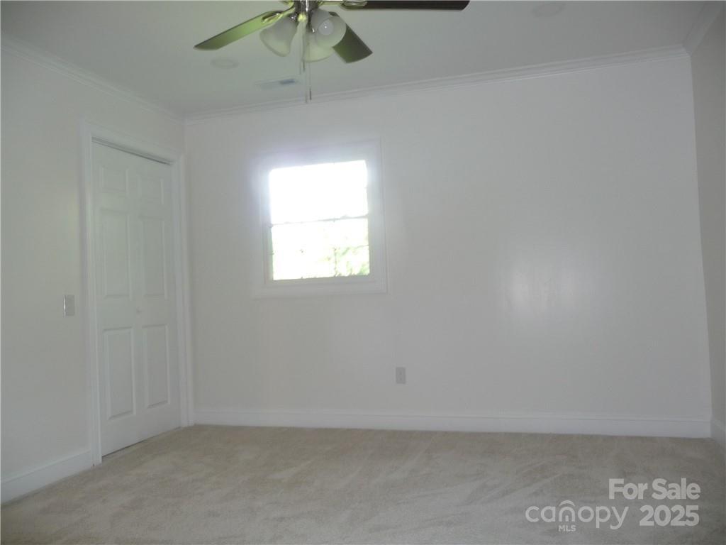 384 New River Heights Road, Unit 12 Boone, NC 28607 - Photo 22 of 30 an empty room with a window