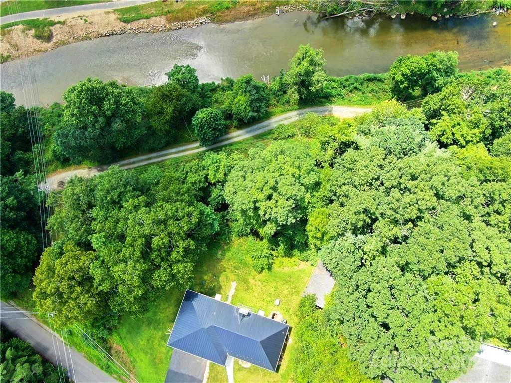 384 New River Heights Road, Unit 12 Boone, NC 28607 - Photo 30 of 30 an aerial view of residential house with outdoor space and lake view